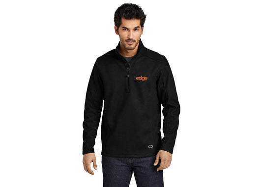 edge - OGIO ® Grit Fleece 1/2-Zip in Black w/ Orange Logo